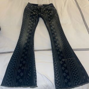 Size 25, patterned flare free people jeans